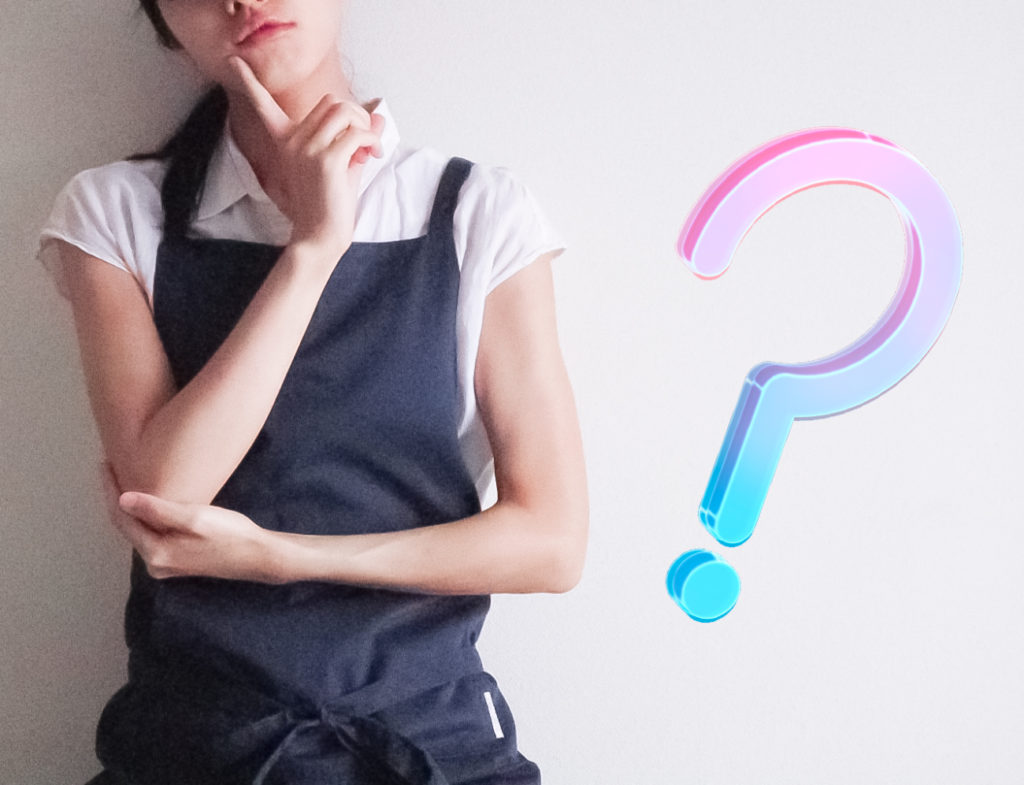 難しそうにする女性